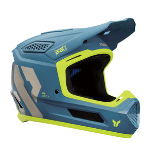 A blue and yellow THOR motorcycle helmet with a modern design, including a visor and multiple ventilation ports.