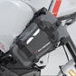 Black motorcycle saddle bag attached to a bike.