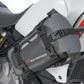 Black motorcycle saddlebag attached to a bike.
