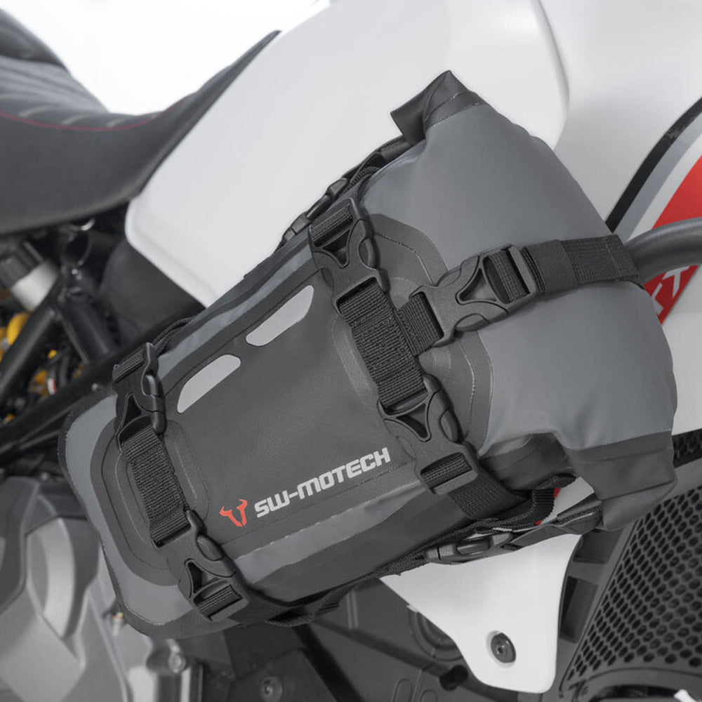 Black motorcycle saddlebag attached to a bike.