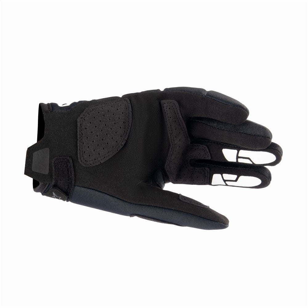 Black glove with a textured palm on a white background
