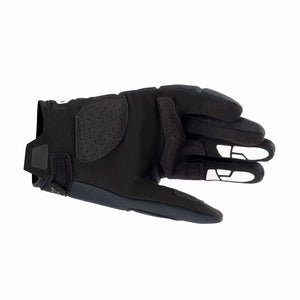 Black glove with a textured palm on a white background